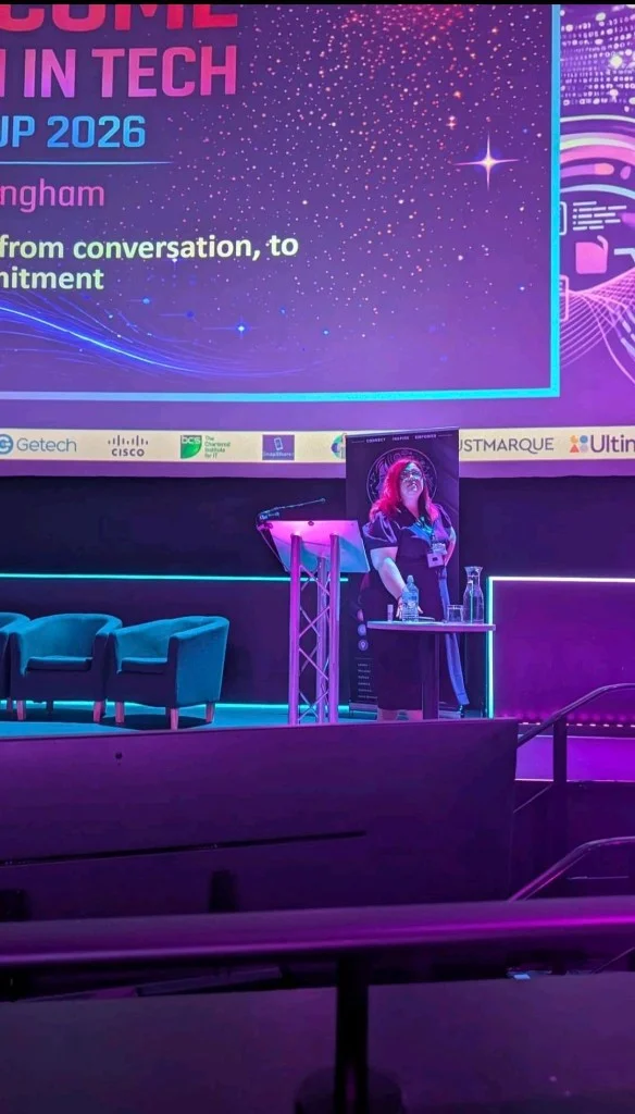 Claire Mironik speaking on stage at Women in Tech Meet Up 2026 Birmingham